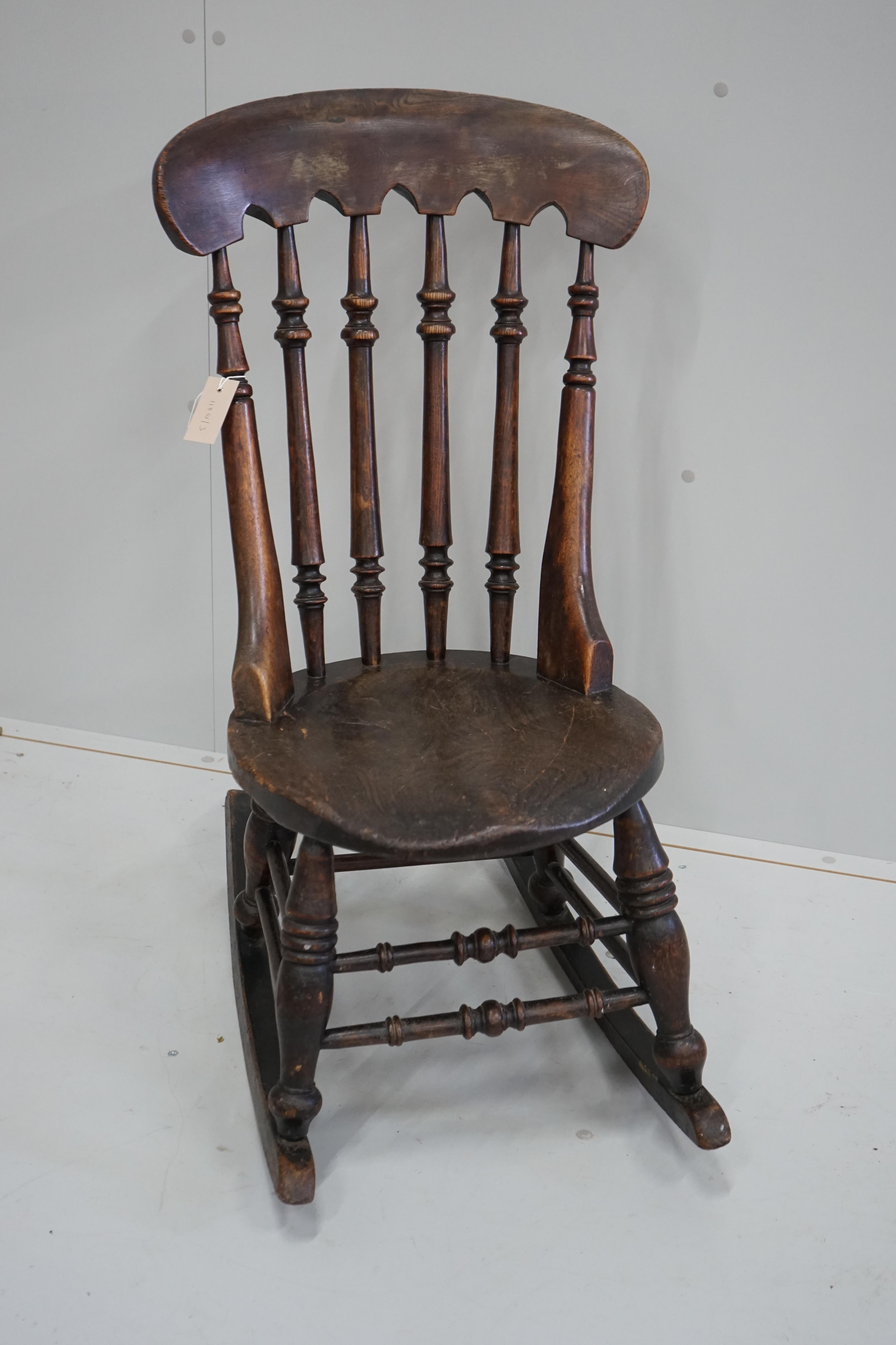 A Victorian elm and beech Windsor rocking chair, height 92cm